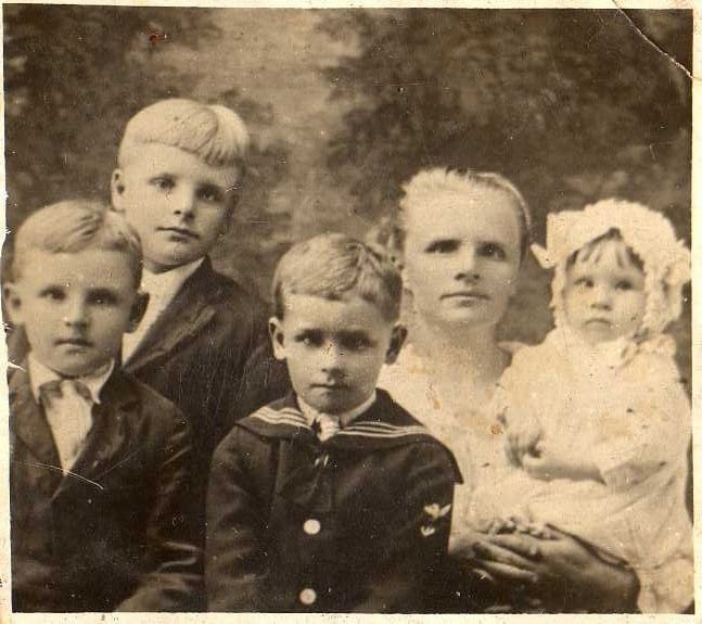A woman and her four children in the 1900s
