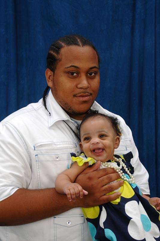 Ryan Stokes, shown here with his daughter Neriha.