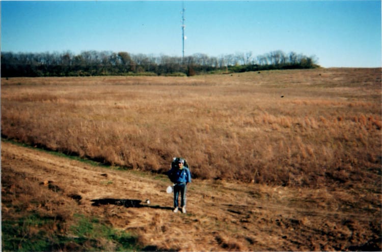 A man walking in a field