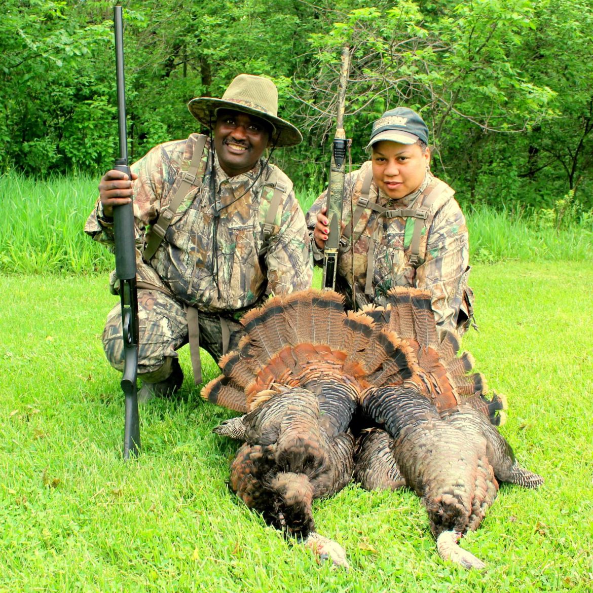 Wayne Hubbard and Candice Price with recently shot turkeys.