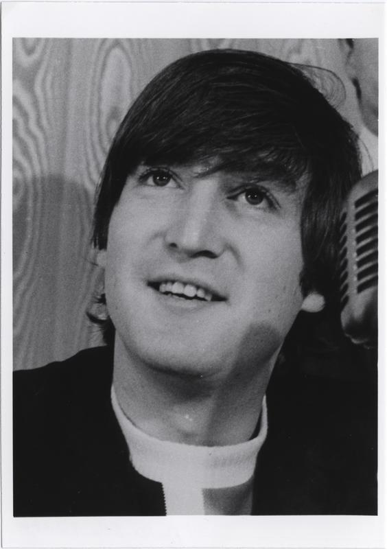 In later interviews Dave Dexter Jr. explained that he had rejected the early Beatles song “Love Me Do” because he didn’t care for the harmonica playing of John Lennon, seen here during the Beatles’ 1964 press conference in Kansas City.