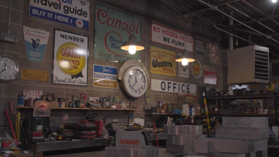 The Fossil Forge workshop is filled with vintage signs of all materials. It's the team's source of inspiration.