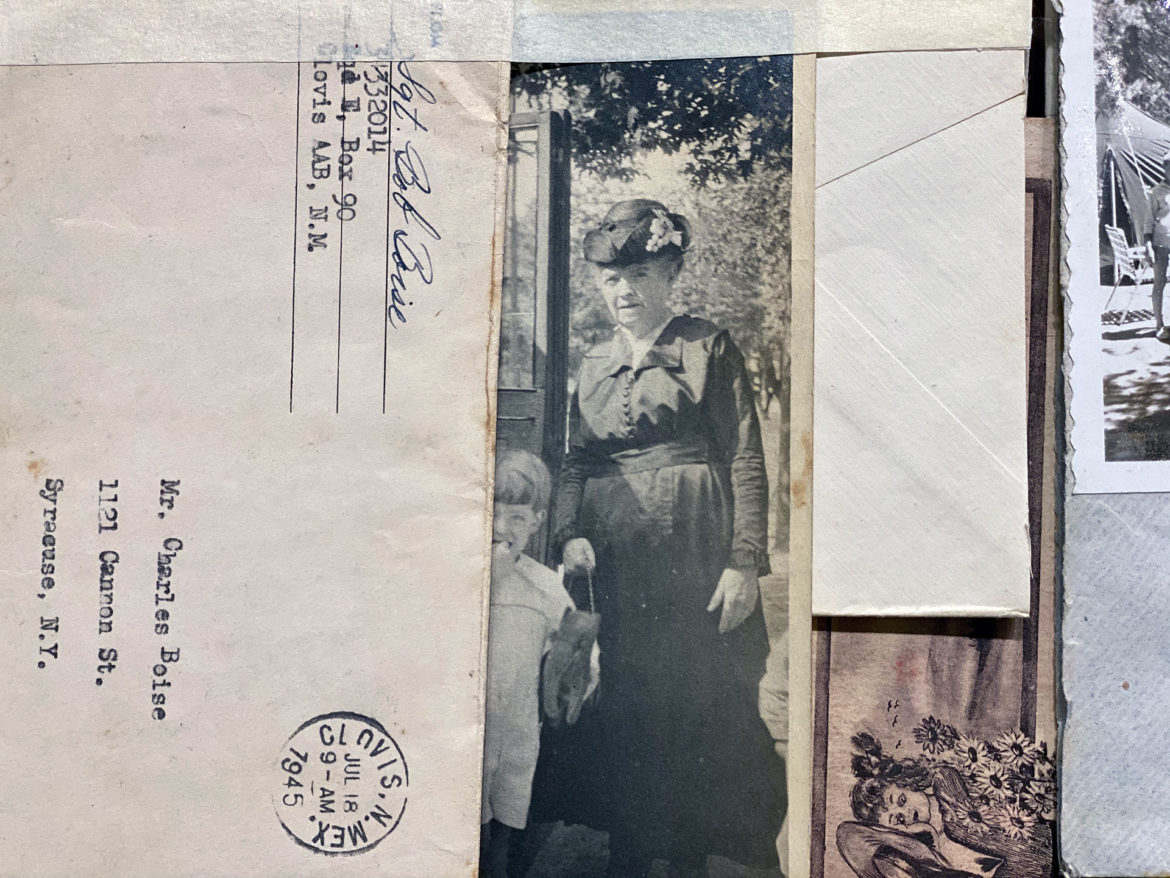 An envelope next to a family photo. 