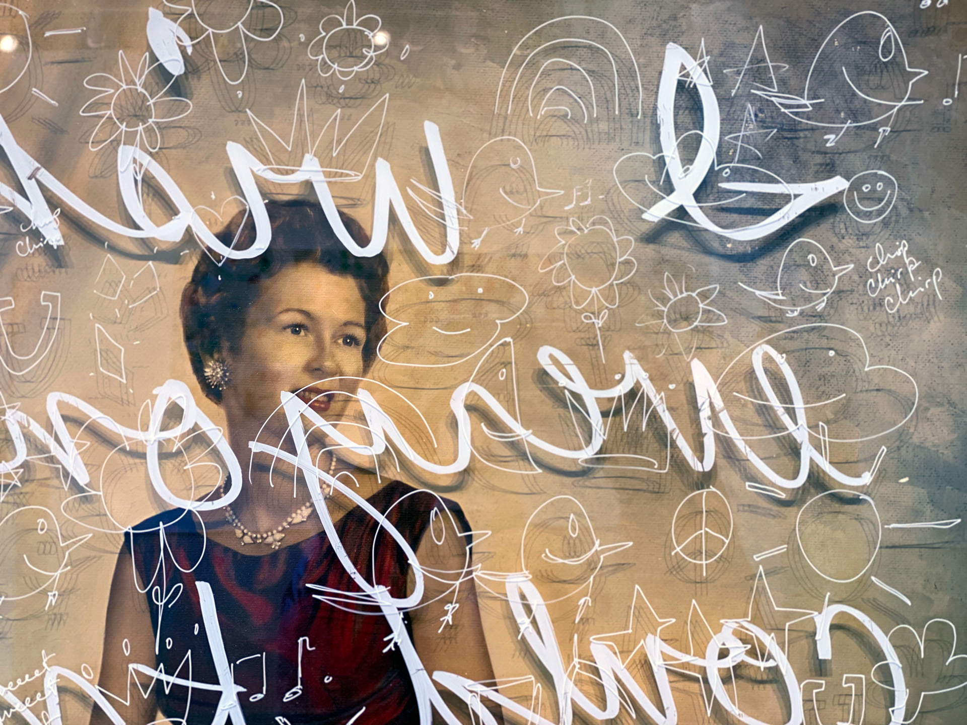 A close-up of the work inspired by Nellie's wish is a traditional portrait with handwriting all over the glass. "I wish everyone could know me on my best days, not my worst."