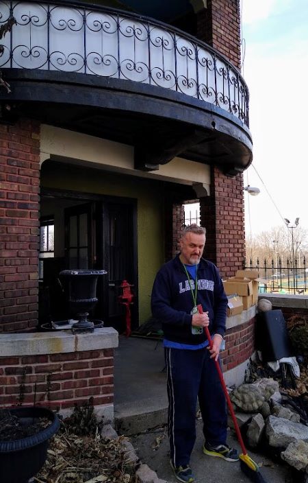 Michael Stringer is an owner of the St. Francis apartment building behind him at 300 Gladstone Blvd.