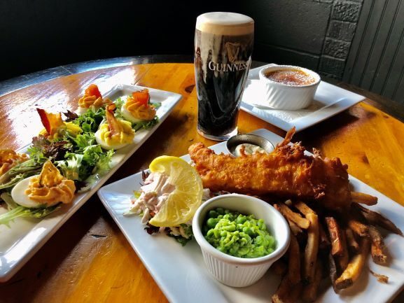 Bacon truffle deviled eggs, fish ‘n’ chips, 5 Farms crème brûlée and Guinness at Brady's Public House.