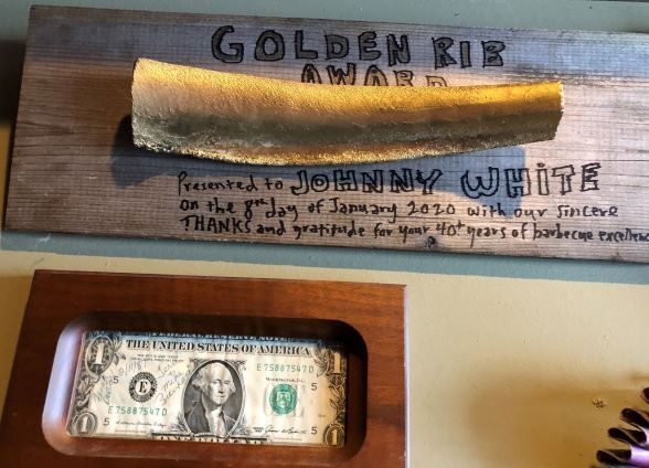 The Kansas City Barbecue Society recently presented Johnny White with a Golden Rib Award