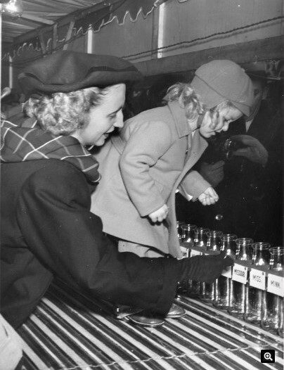 In 1947 Margaret Truman helped a child drop dimes into milk bottles, launching the annual March of Dimes fundraiser in Washington, D.C. 