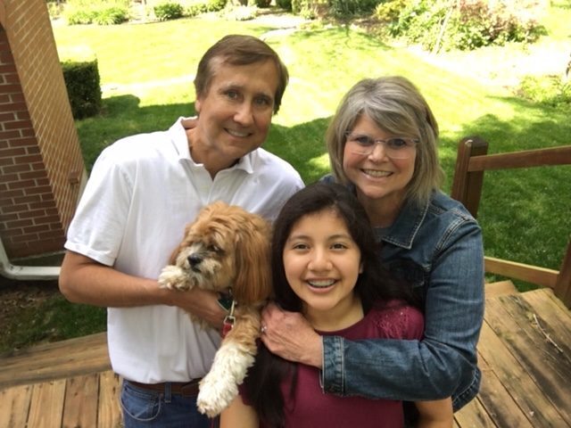 The Moorman family with Cheryl, Tom, Madi, and dog Jordy
