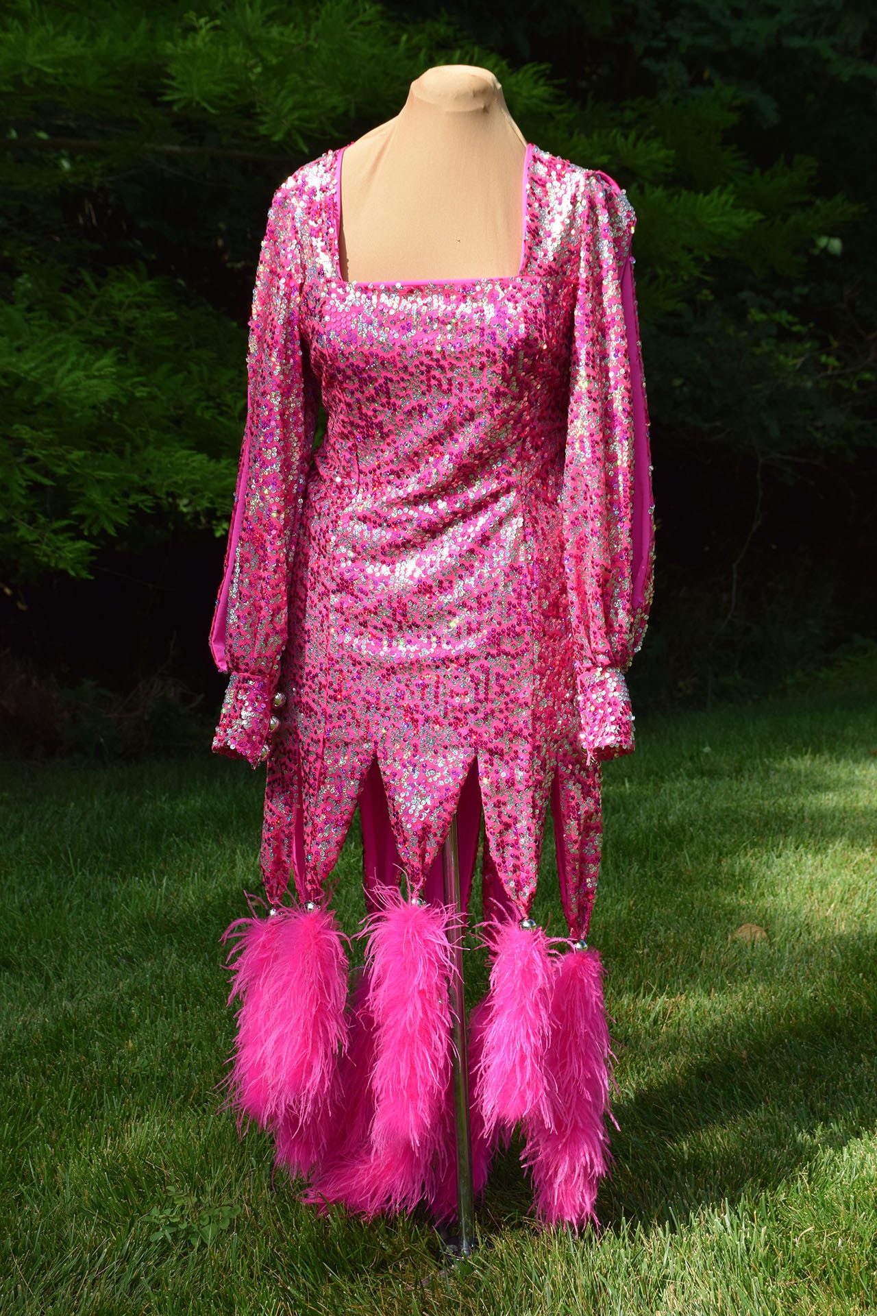 Pink dress with feathers