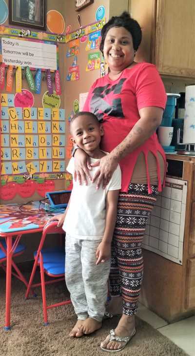 Eboney Allmon with her grandson, Jordhan.
