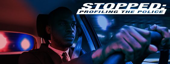 Stopped: Profiling the Police; Youngish Black male behind wheel of car with red and blue lighting