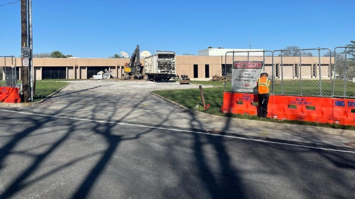 Dehn Demolition workers preparing to remove the old Entercom radio station facility in Westwood.Workers from Dehn Demolition preparing to remove the old radio station facility in Westwood.