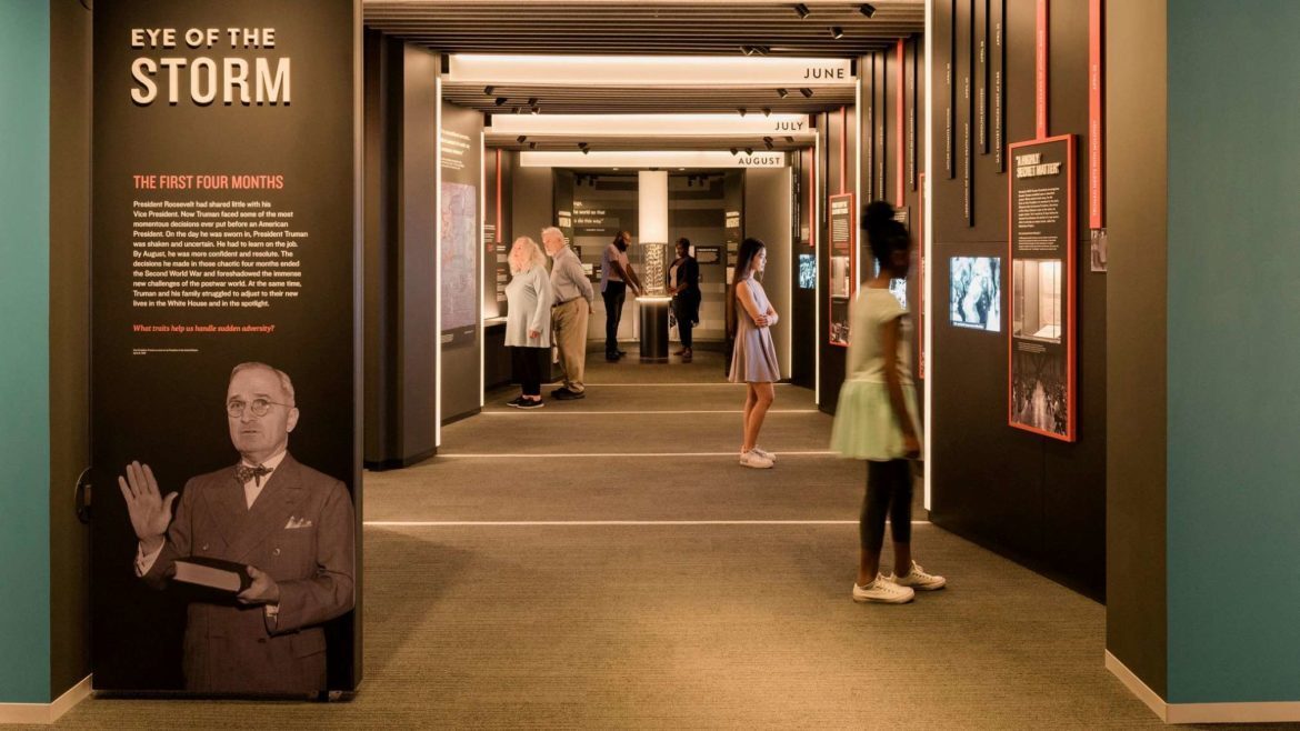 Cascading video screens depict the many challenges facing the new President Harry Truman following the April 1945 death of Franklin Roosevelt.