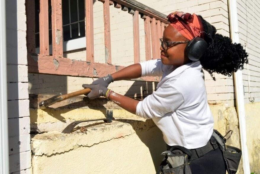 Bilha Kahindi is a community member with Jerusalem Farm, a nonprofit that helps residents make home repairs. She works on a home in Kansas City's Historic Northeast.