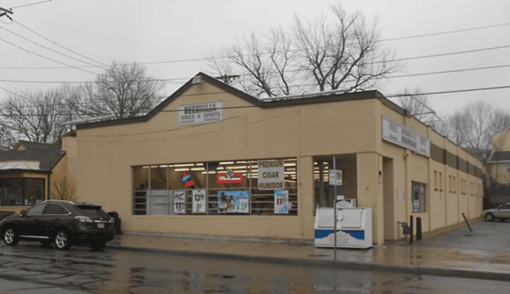 A brown building, formerly a Berbiglia location.