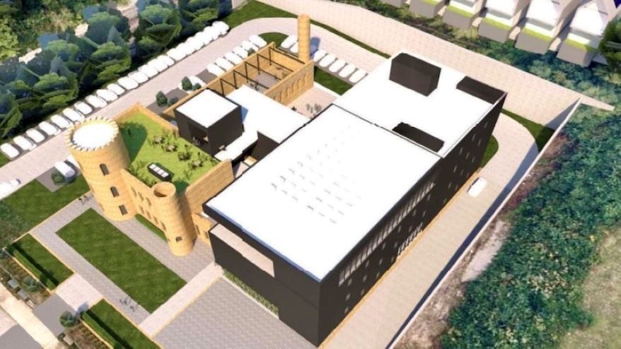 The Jazzonian hotel concept would include a rooftop deck and courtyard. The redevelopment plan calls for 60 energy-efficient houses (background) to be built as well.