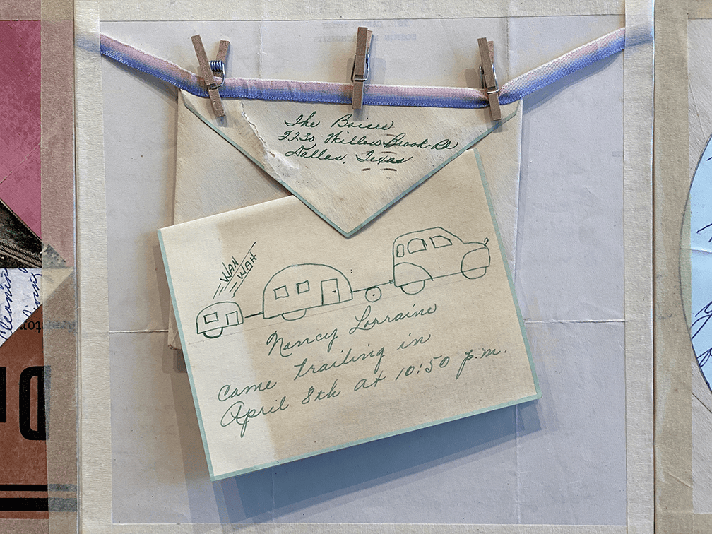 A handwritten birth announcement in green ink.