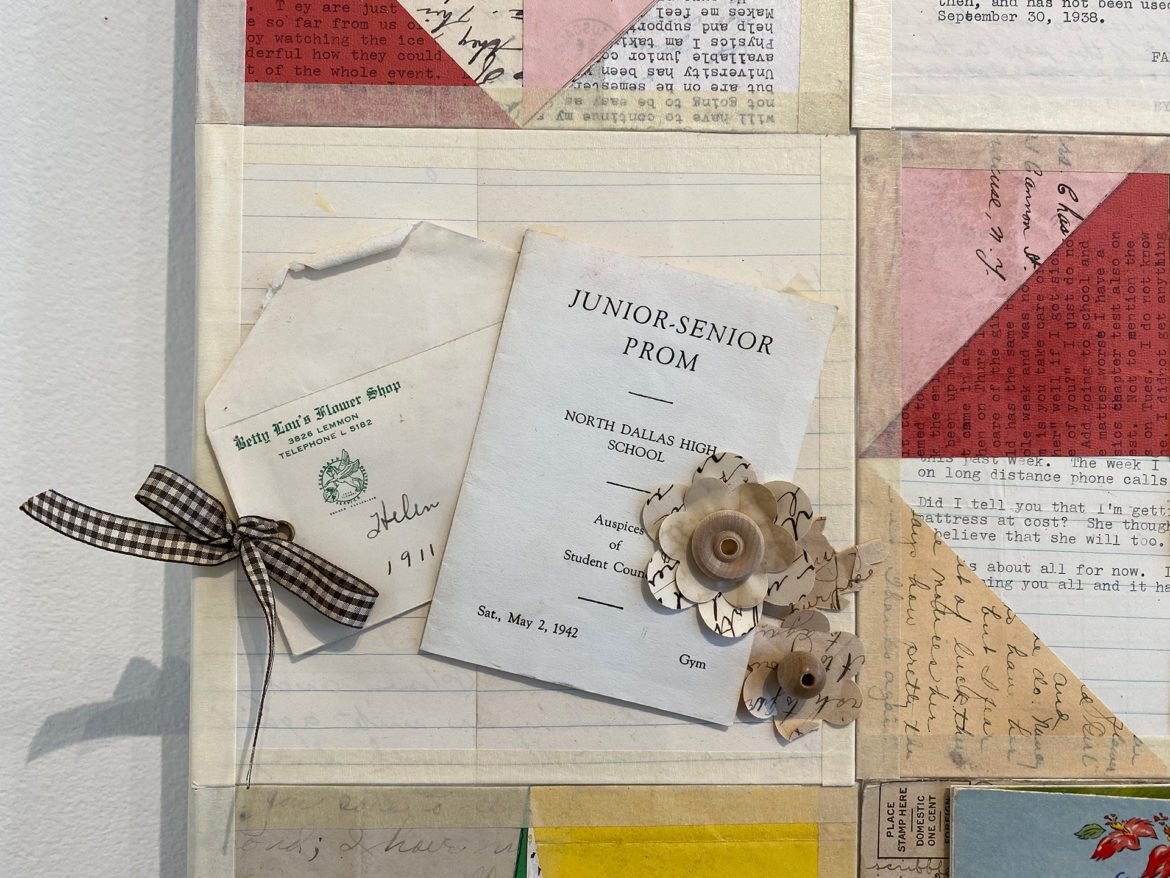 A Junior Senior Prom pamphlet atop a flower card envelope. .